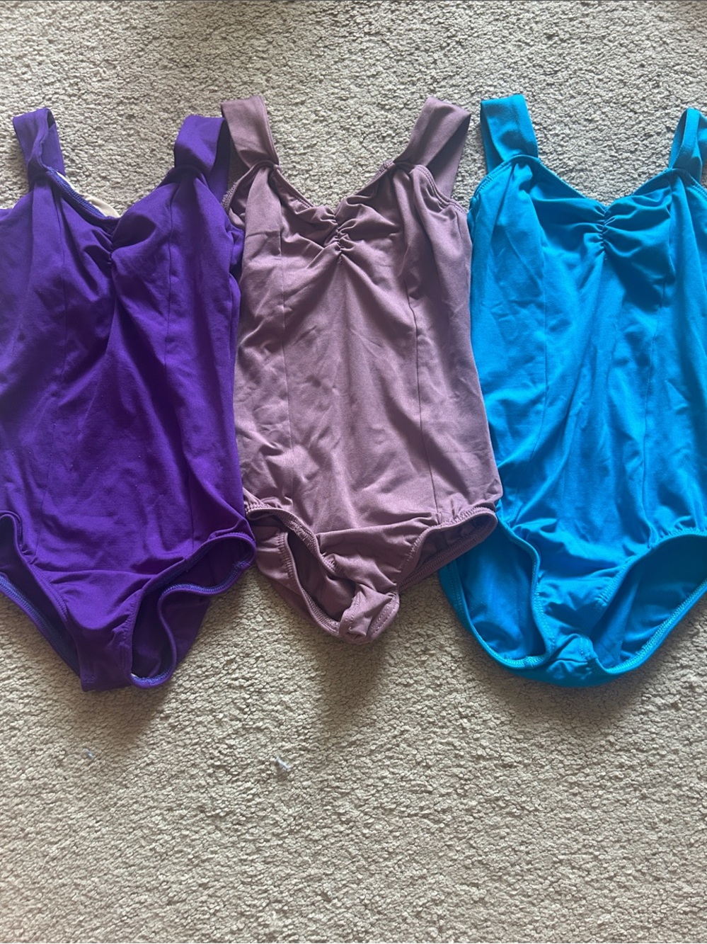 Kids dance leotards in Purple, Mauve, and Teal